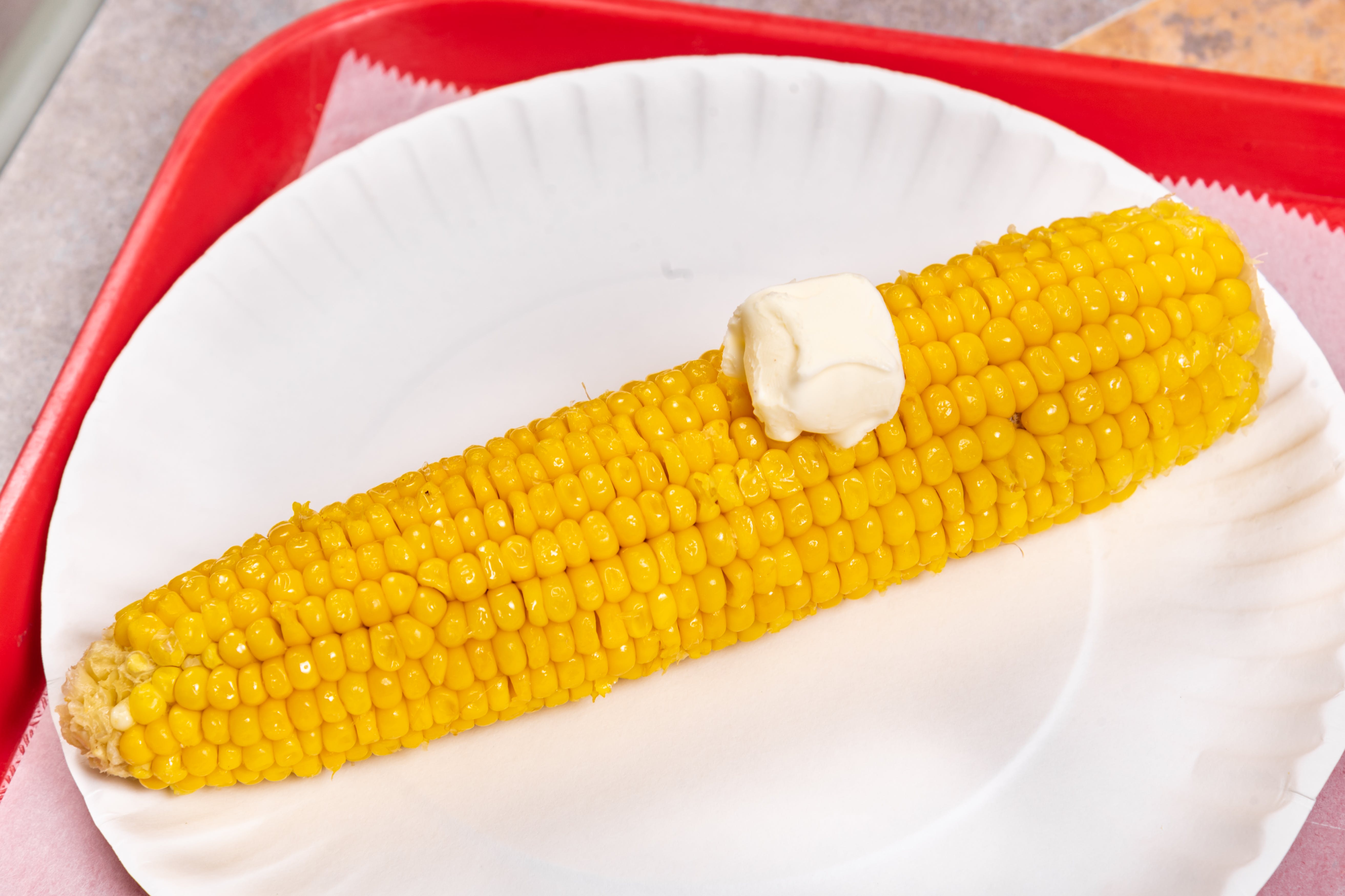 Order 92. Corn on the Cob - Side food online from Kennedy Chicken Pizza & Kabab store, Bronx on bringmethat.com