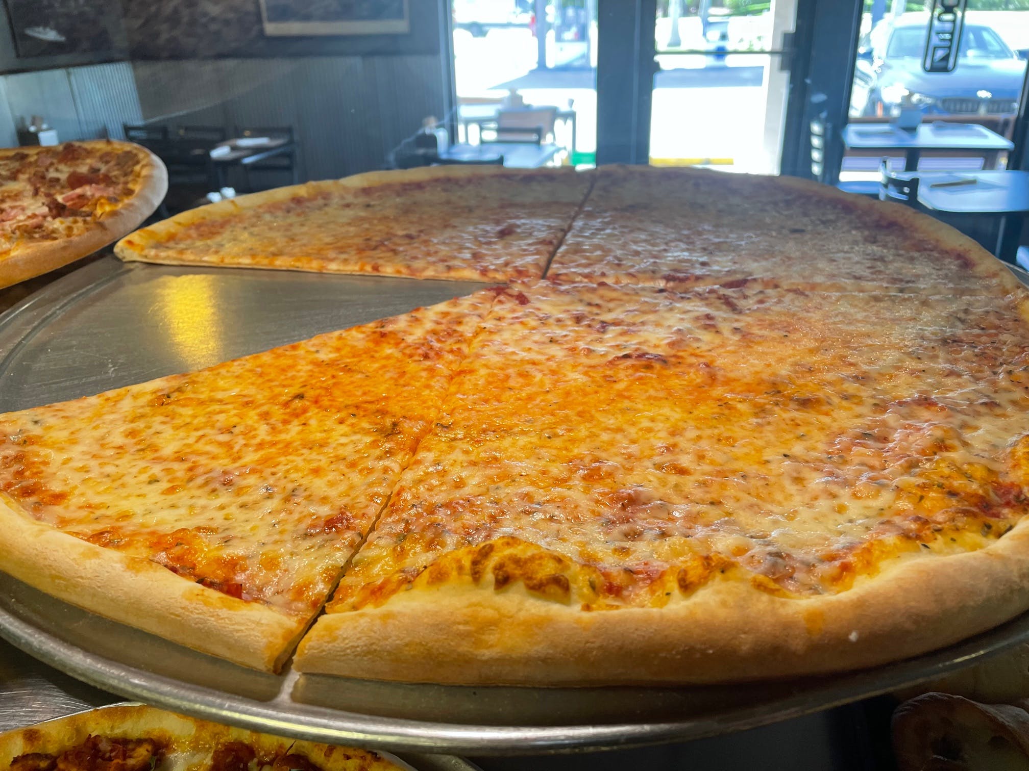 Order Regular Cheese Pizza - 14" food online from Goodfella's Pizza store, Jupiter on bringmethat.com
