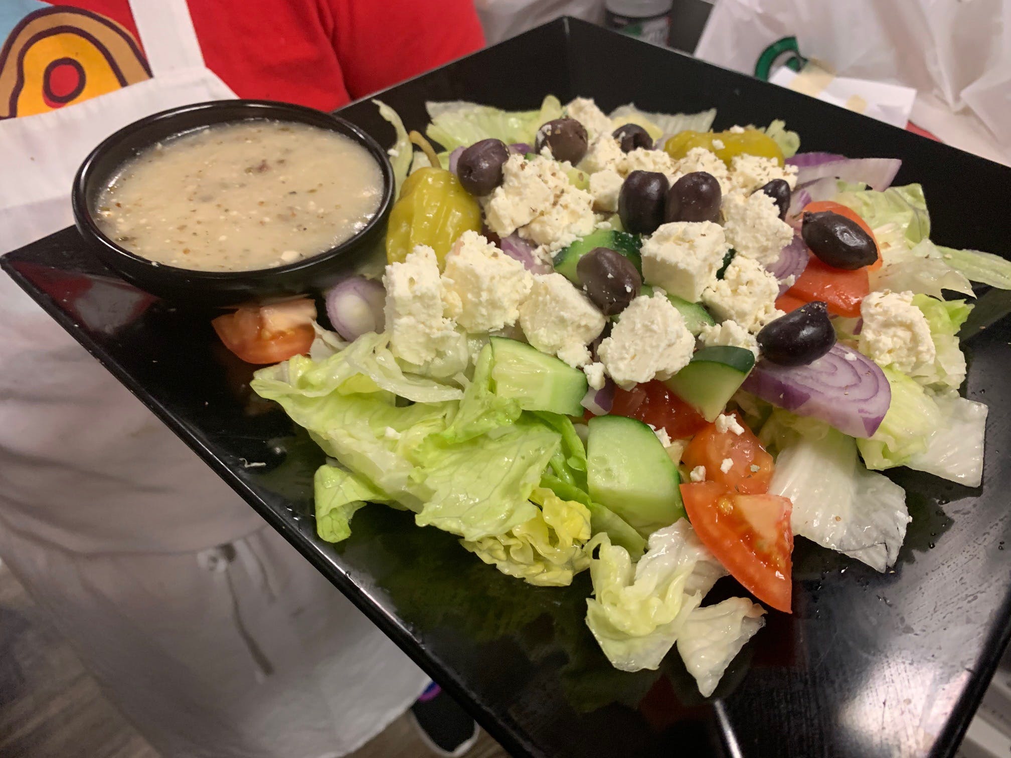 Order Greek Salad - Salad food online from Goodfella's Pizza store, Jupiter on bringmethat.com