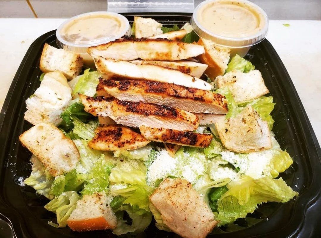 Order Caesar Salad with Grilled Chicken - Salad food online from Goodfella's Pizza store, Jupiter on bringmethat.com