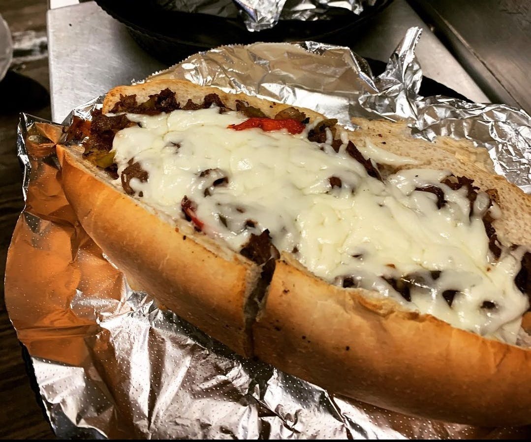 Order Philly Cheese Steak Sub - Sub food online from Goodfella's Pizza store, Jupiter on bringmethat.com