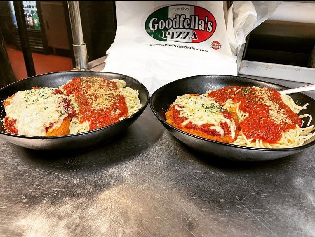 Order Chicken Parmigiana - Entree food online from Goodfella's Pizza store, Jupiter on bringmethat.com