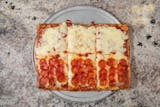 Sicilian Deep Dish Pizza Slice