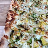 Brussel Sprouts & Caramelized Onions Pan Pizza Slice