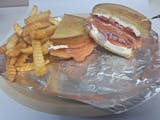 lax sandwiches and rye bread  cream  cheese. tomatoes. red onions  toast