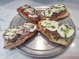 4 pieces of bruchetta 2 balsamic glazed 2 fresh  pesto