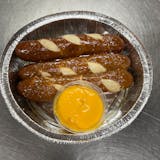 Fresh baked pretzels w cheese sauce