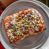 Sicilian Thick Crust Supreme Pizza Slice