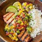 Special ! Grilled salmon with mango salsa & lemon caper butter sauce , served over white rice.