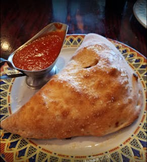 Quattro Formaggi Calzone