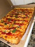 Thinner sicilian pie with added garlic and basil