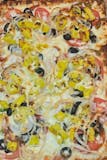 Greek Pizza w/ Onions, Peppers, Olive, Tomatoes & Banana Peppers.