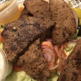 Beef Kabob Over Greek Salad