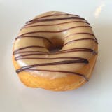 Maple icing, chocolate drizzled raised donut