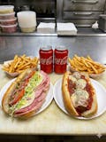 Two 12” Subs, 2 Fries & 2 Cans of Soda