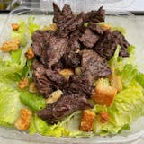 Steak Tip Over Caesar Salad