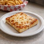 Sicilian Cheese Pizza Slice