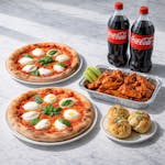 C). Two Large Regular Pies, 2 Garlic Knots, Two 1.5 Liter Sodas, 1/2 Tray Wings Special