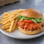 Buffalo Chicken Sandwich w/ff (Fried chicken tossed in Buffalo sauce, mayo, lettuce, and tomato.)
