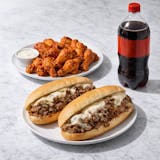 Two Cheesesteaks, 12 Buffalo Wings, & One 2 Liter Soda Special 