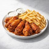 Chicken wings with fries 