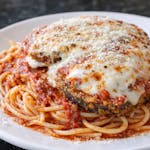 Eggplant Parmigiana over Spaghetti