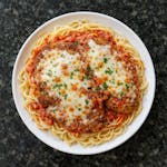 Veal Parmigiana over Spaghetti